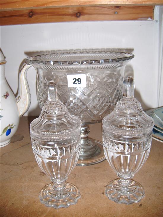 Waterford cut glass pedestal bowl and a pair of lidded vases(-)